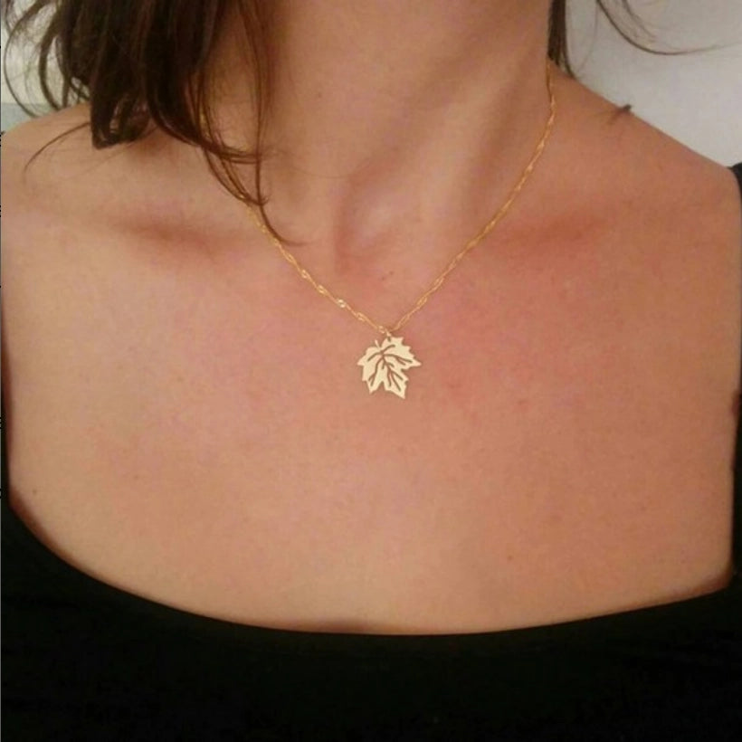 Collier feuille d'arbre en Or 18 carats