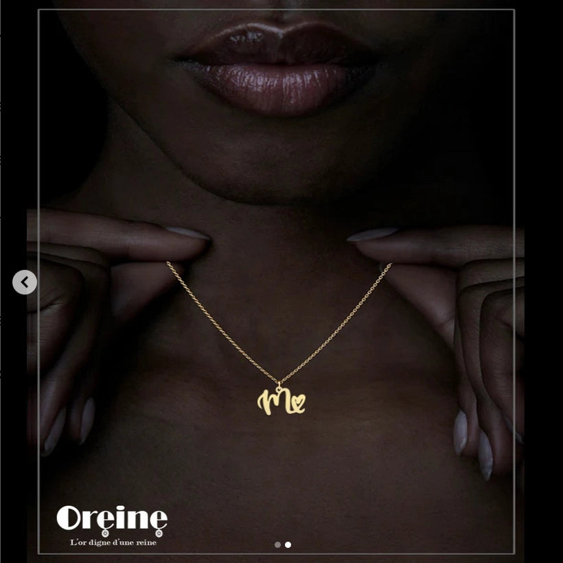 Collier lettre initiale avec coeur attaché en Or 18 carats