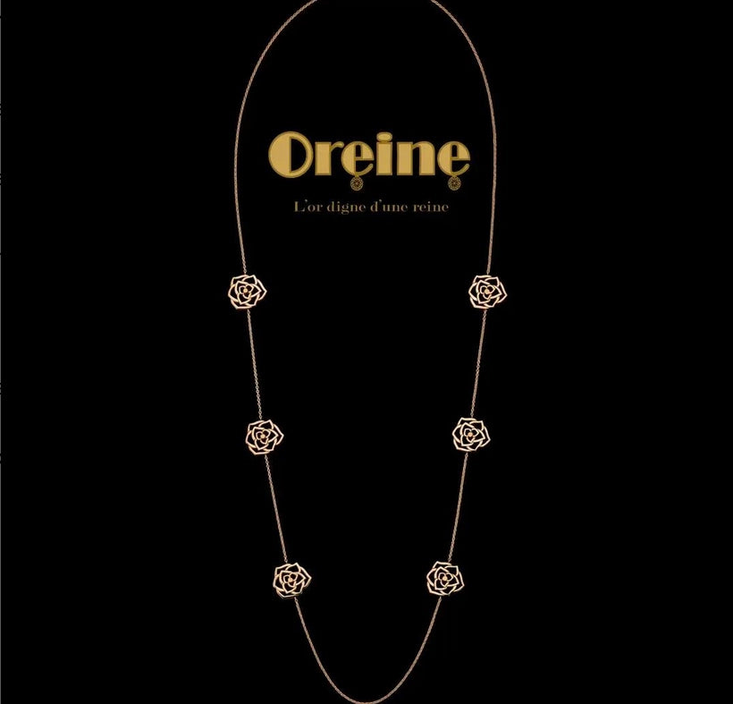 Collier sautoir avec 6 fleurs en Or 18 carats