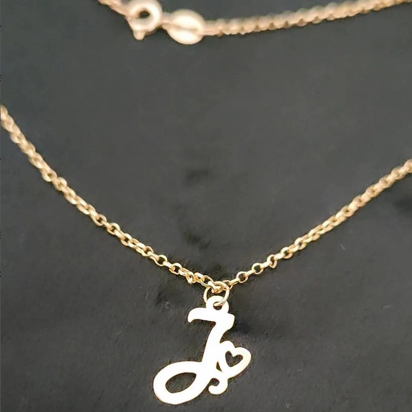 Collier initiale personnalisable avec petit coeur avec chaine chopard en Or 18 carats