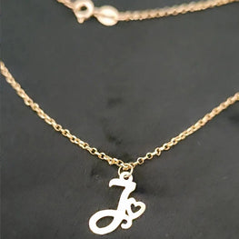 Collier initiale personnalisable avec petit coeur avec chaine chopard en Or 18 carats