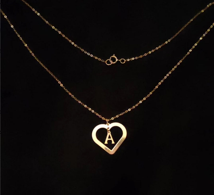 Collier avec lettre initiale dans un coeur en Or 18 carats