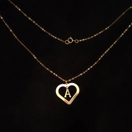 Collier avec lettre initiale dans un coeur en Or 18 carats