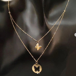 Double collier attaché avec papillon en Or 18 carats