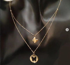 Double collier attaché avec papillon en Or 18 carats