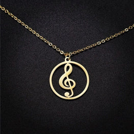 Collier note de musique 🎼 en Or 18 carats